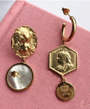 Wandering ladybird mismatch earrings.
