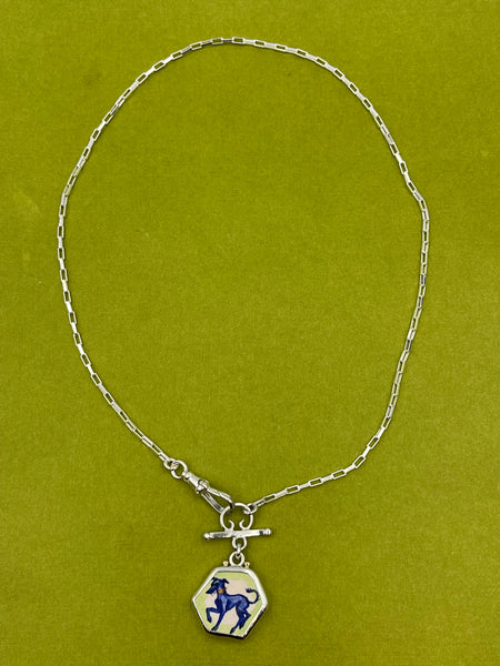 Little prancing hound pendant